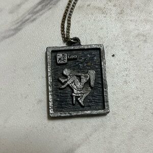Vintage 1970s Leo Silver Tone Astrology Pendant